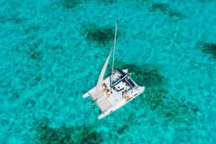 Private catamaran under sail on a Cancun yacht rental to Isla Mujeres, Quintana Roo, Mexico