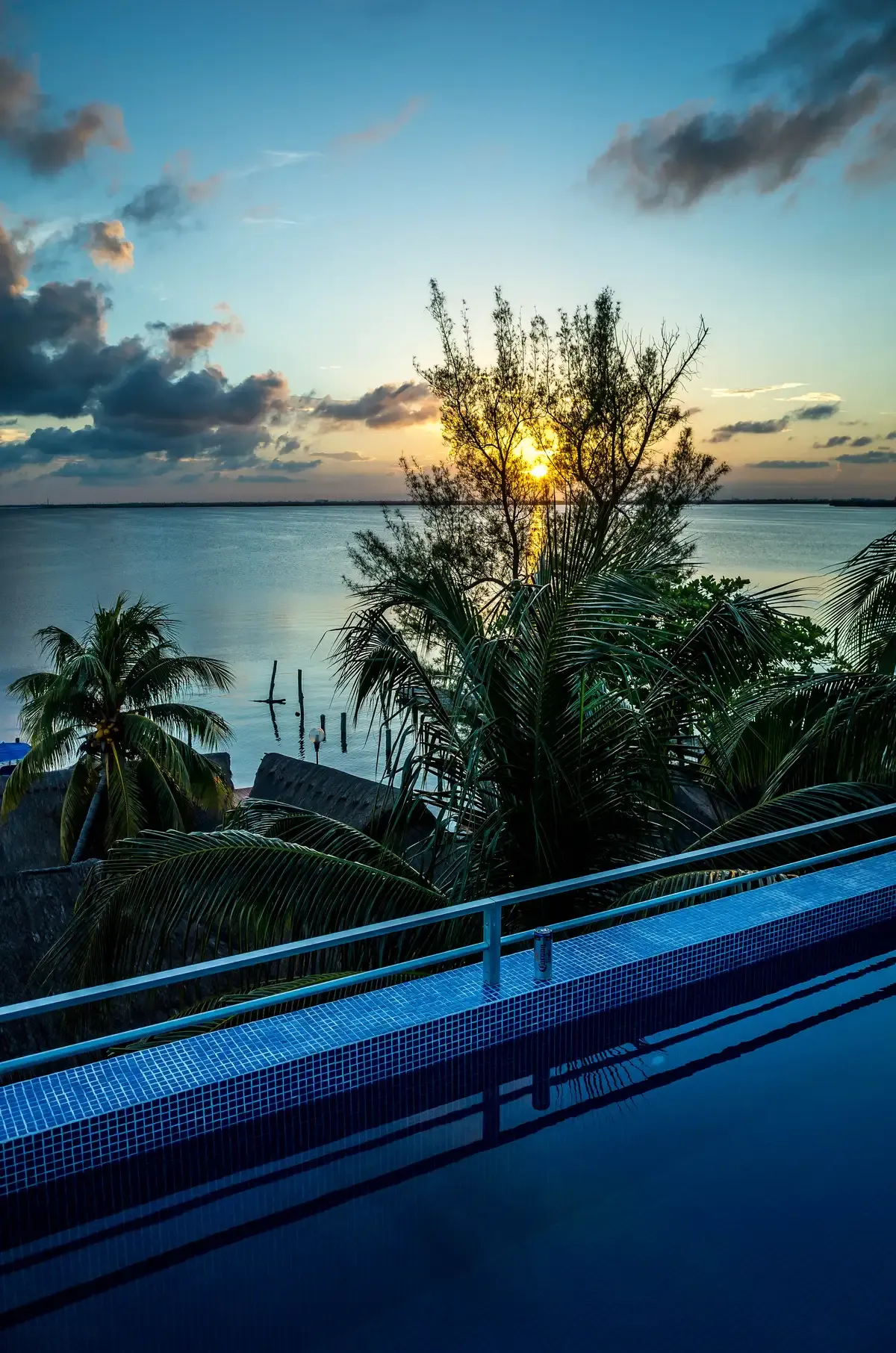 Sunrise over the Nichupte Lagoon, the water Cancun yacht rentals cross from the Hotel Zone marinas