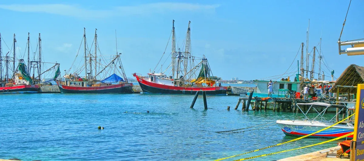 Boats moored at the marina at Puerto Juarez north of downtown, a departure point for Cancun yacht rentals and Isla Mujeres boats